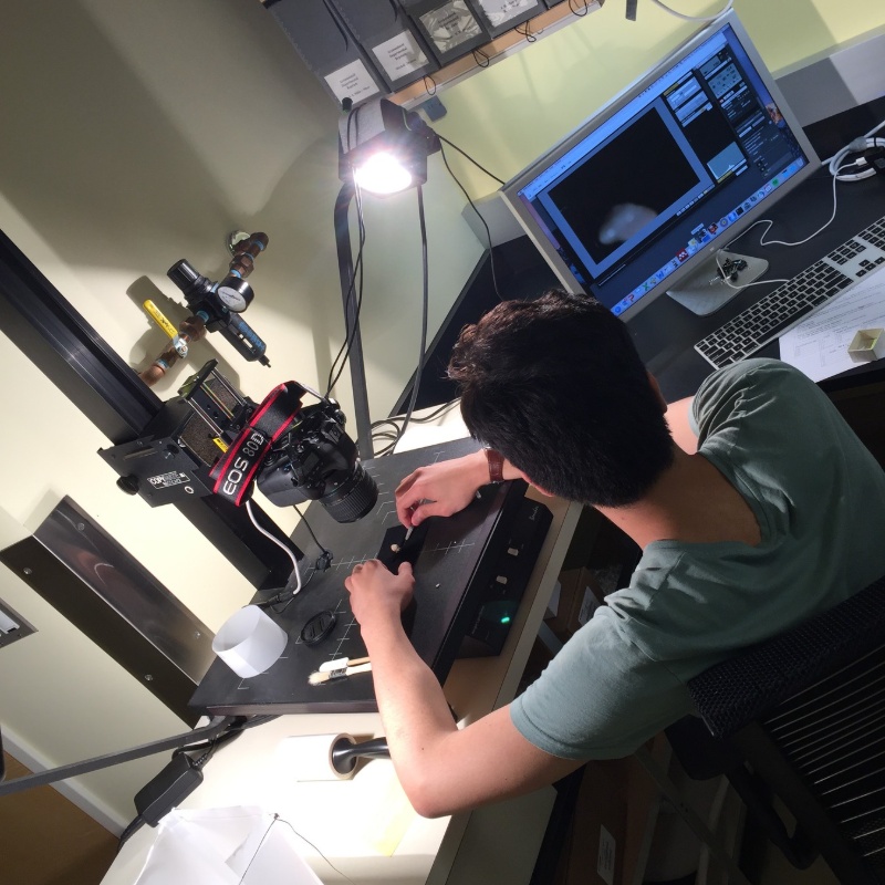Jesse photographing fossil shells